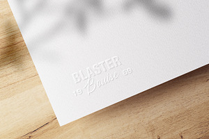 Embossed Logo Mockups On White Paper