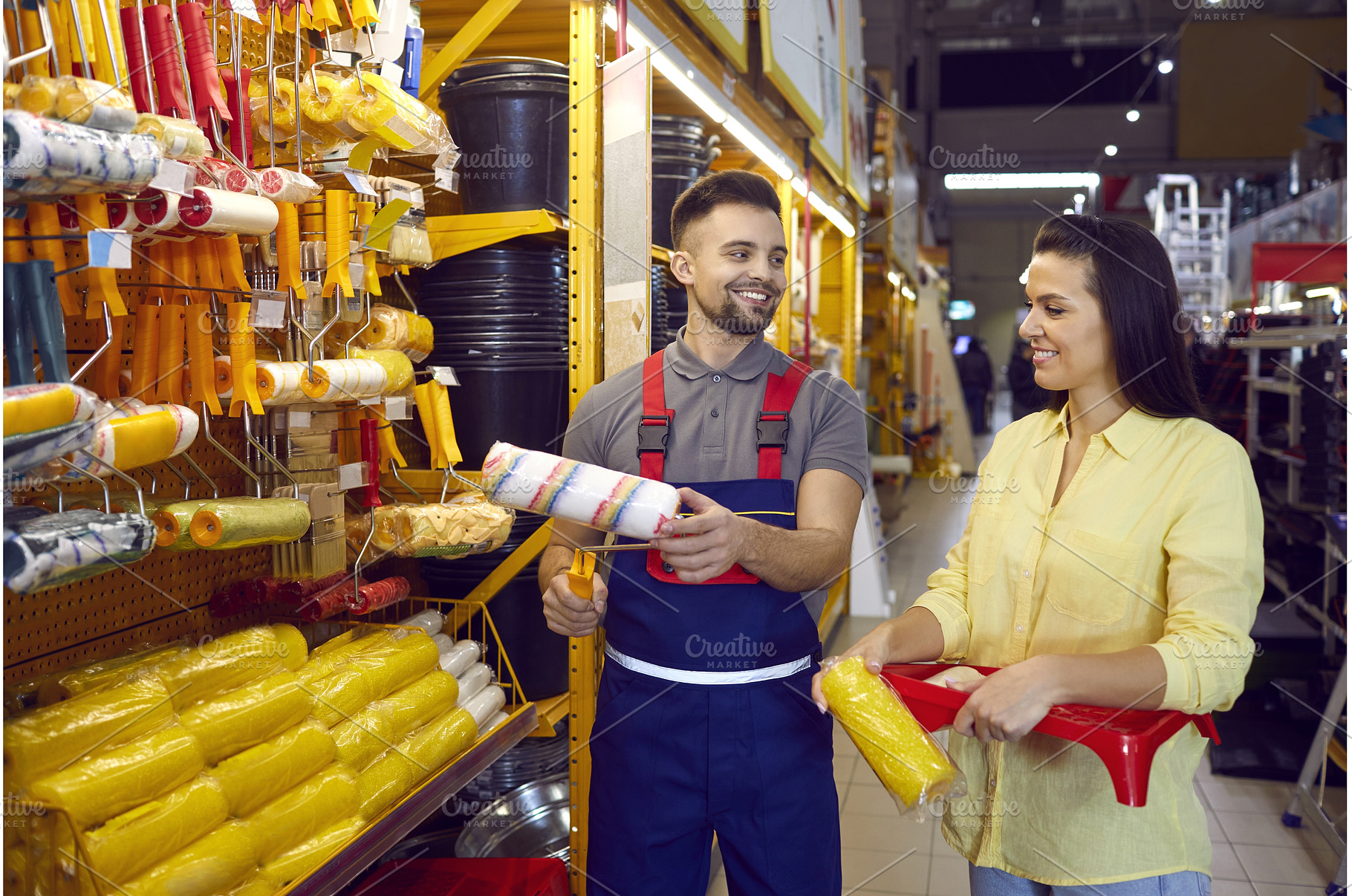 Woman with help of male salesman, a Person Photo by StudioRomantic