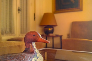 Warmly lit vintage-style room scene, an Architecture Photo by DanFLCreativo