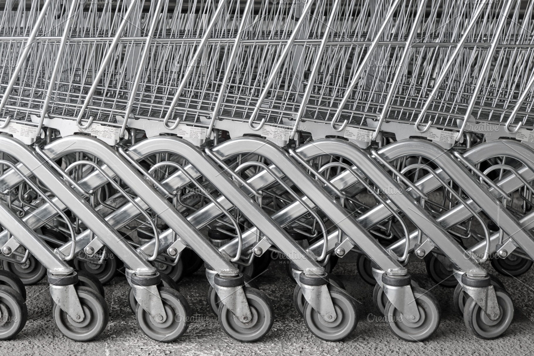 Supermarket shopping cart trolleys, an Industrial Photo by BOOCYS