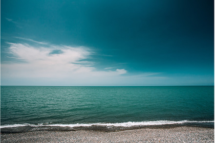 Sunny Sky Over Calm Water Of Sea Or, a Nature Photo by Our Amazing World