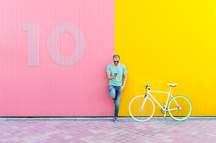Handsome man using mobile stock photo containing mobile and man, a Person Photo by nunezimage