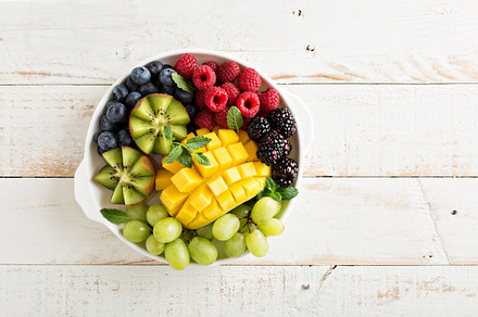 Fruit plate with berries mango and kiwi stock photo containing fruit and plate, a Food & Drink Photo by farwasser
