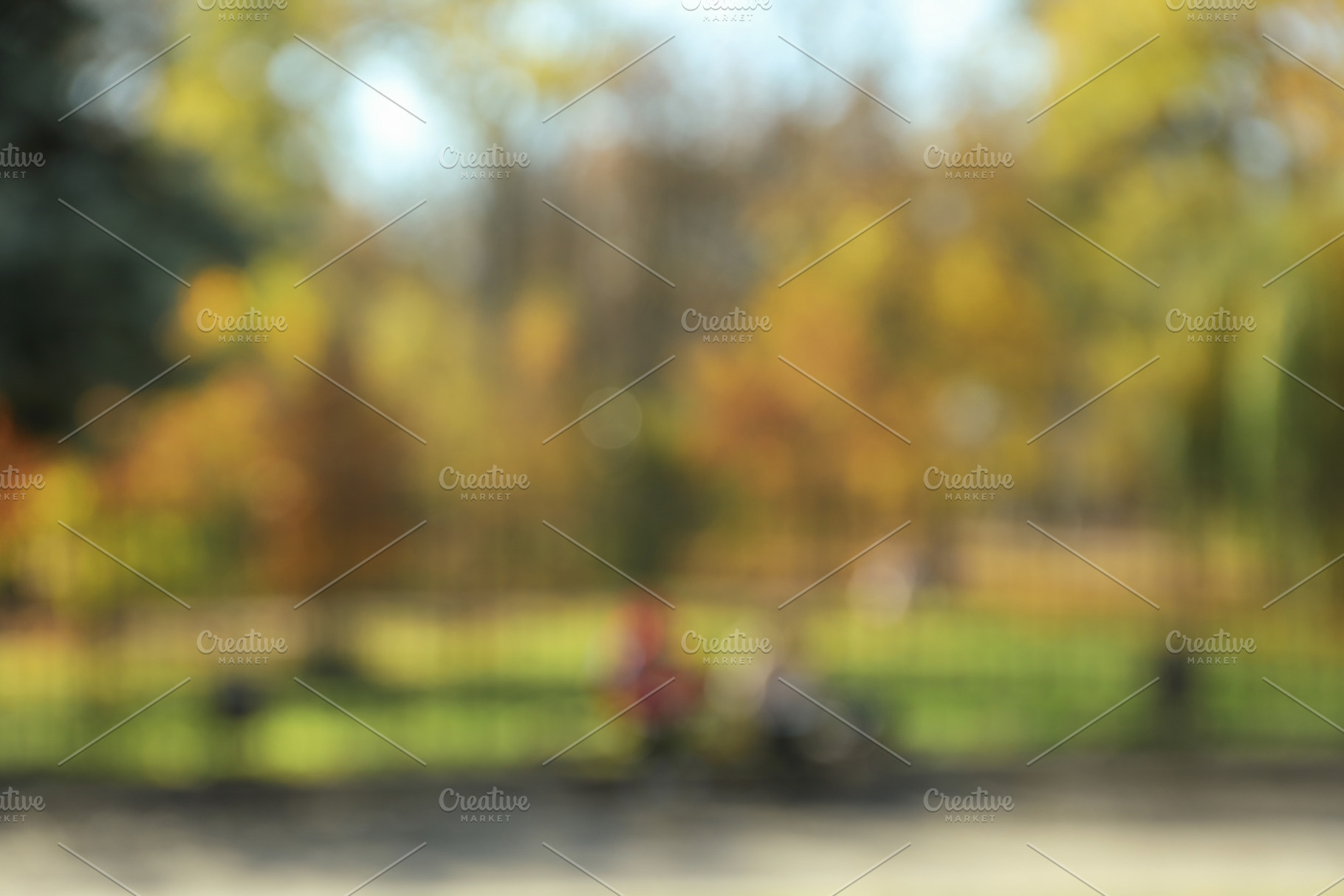 Blurred photo of city park in autumn day, a Holiday Photo by AtlasStudio PRO