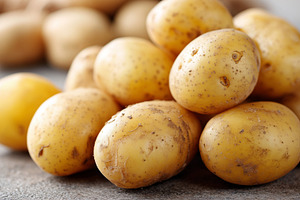 Pile of fresh raw potatoes, a Food & Drink Photo by MistyDay