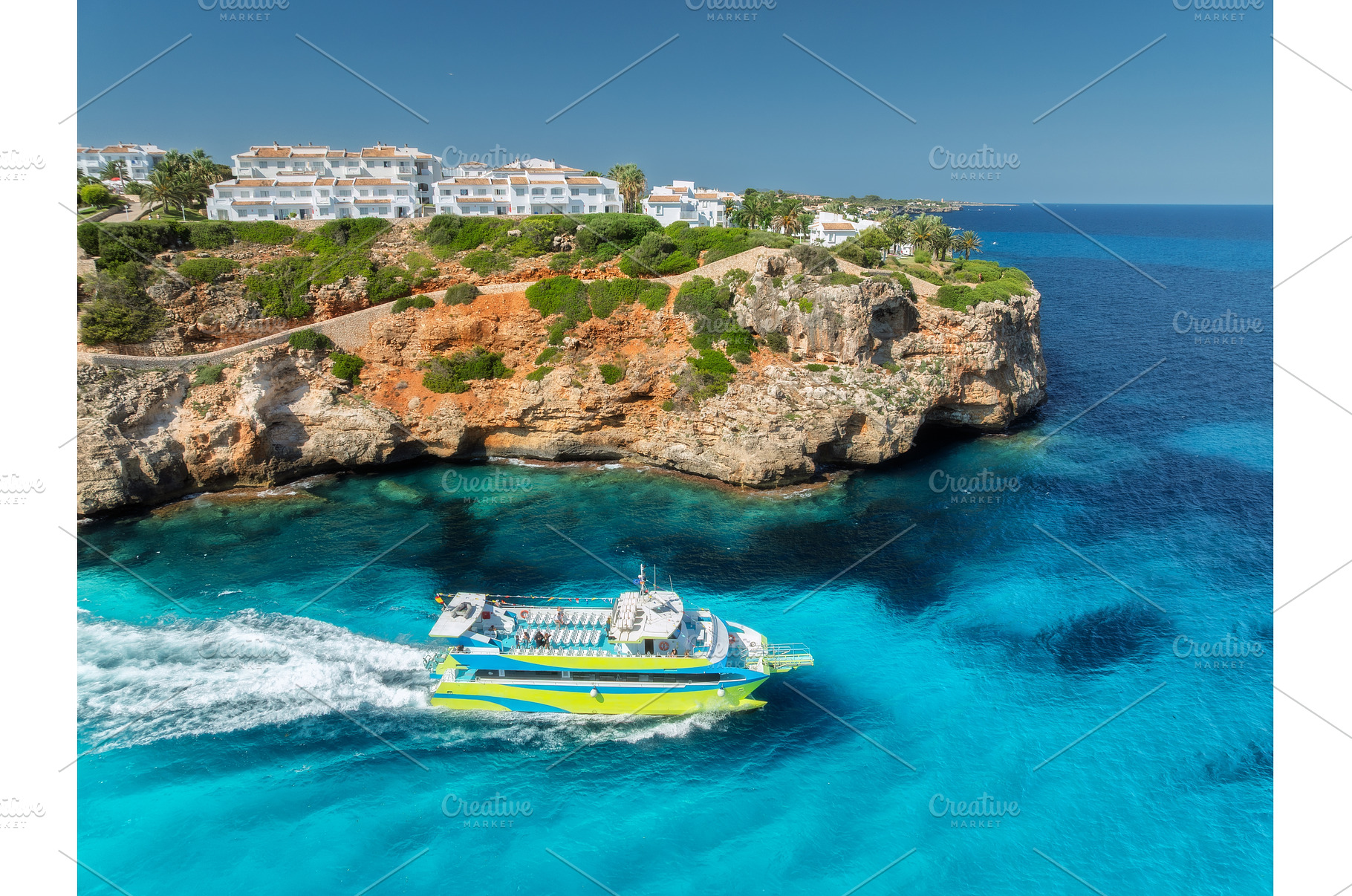 Aerial view of green yacht, sea with, a Nature Photo by den-belitsky