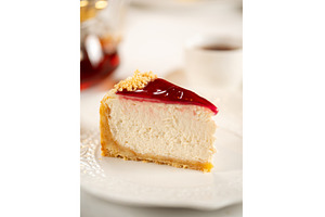 Perfect cheesecake piece on plate, a Food & Drink Photo by Fascinadora