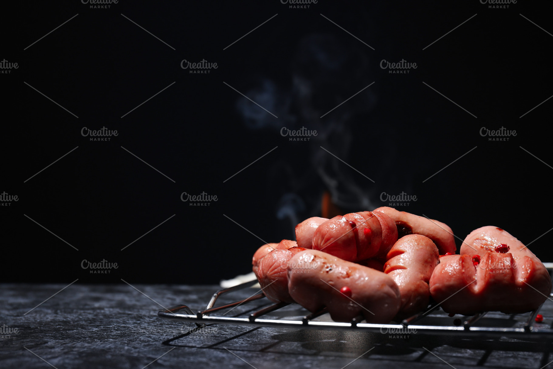 Concept of tasty food, grilled mini sausage, space for text, a Background Photo by AtlasStudio PRO