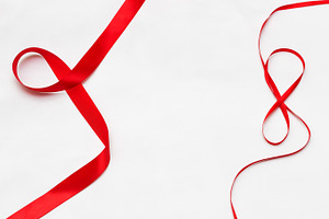 Red tape on a white background.