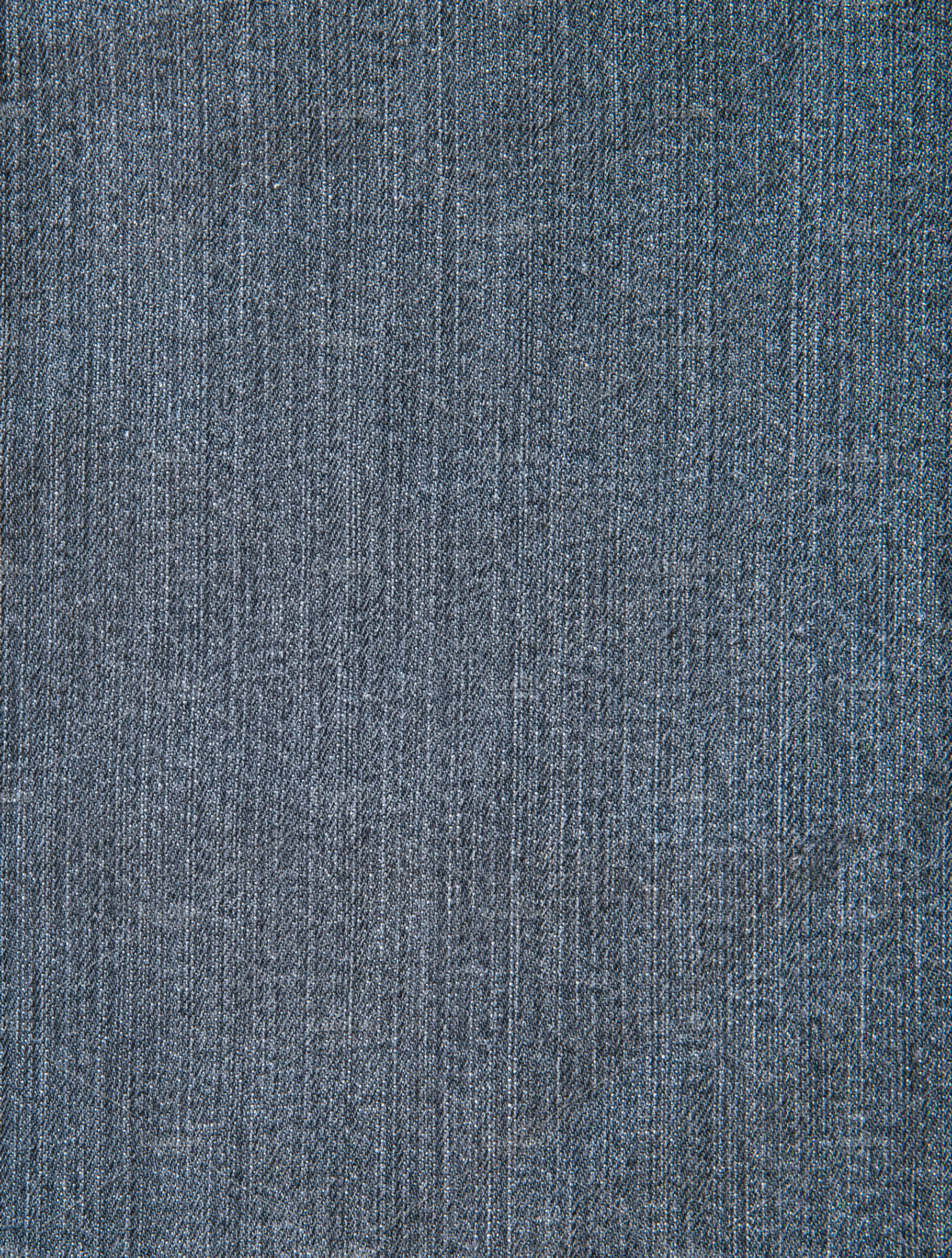 Texture of worn blue jeans, a Background Photo by Floor