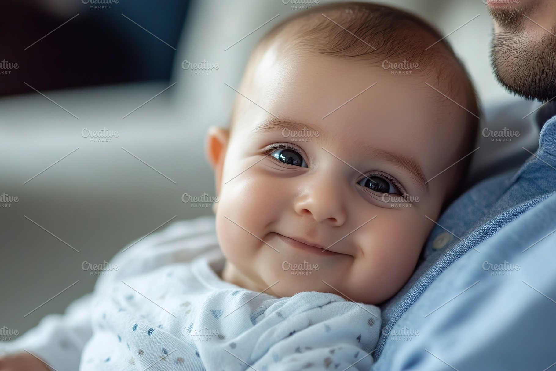Baby smiles happily while being held by a parent at home during the afternoon, a Person Photo by AlyaAnd