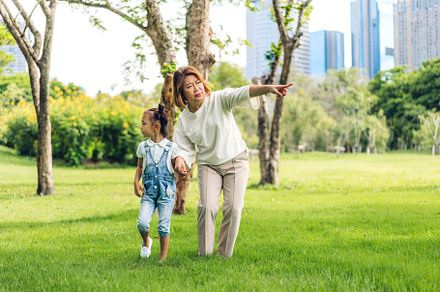 Portrait of happy love asian grandmother and little asian cute g, a Person Photo by Art_Photo
