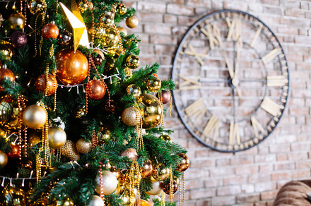Decorated christmas tree in gold and stock photo containing ball and bauble