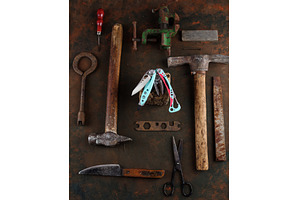 Beautiful new knife and old tools, an Industrial Photo by Stockphoto by vzwer