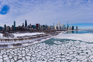 Urban Skyline of Chicago Loop and Frozen Lake Michigan with Ice