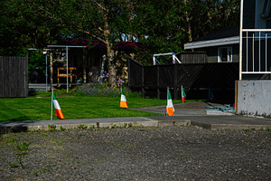 Flags representing Irish culture during a celebration in Akranes, Iceland, a Photo by AS photostudio