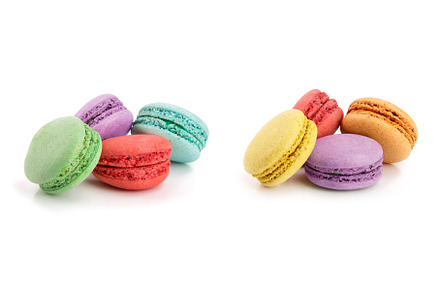 four macaroons isolated on white, a Food & Drink Photo by NataPhoto