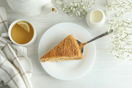 Concept of tasty dessert with honey cake, top view, a Food & Drink Photo by AtlasStudio PRO