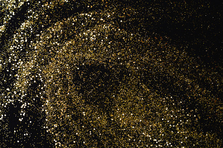 Glitter on the black background containing black, background, and sequins