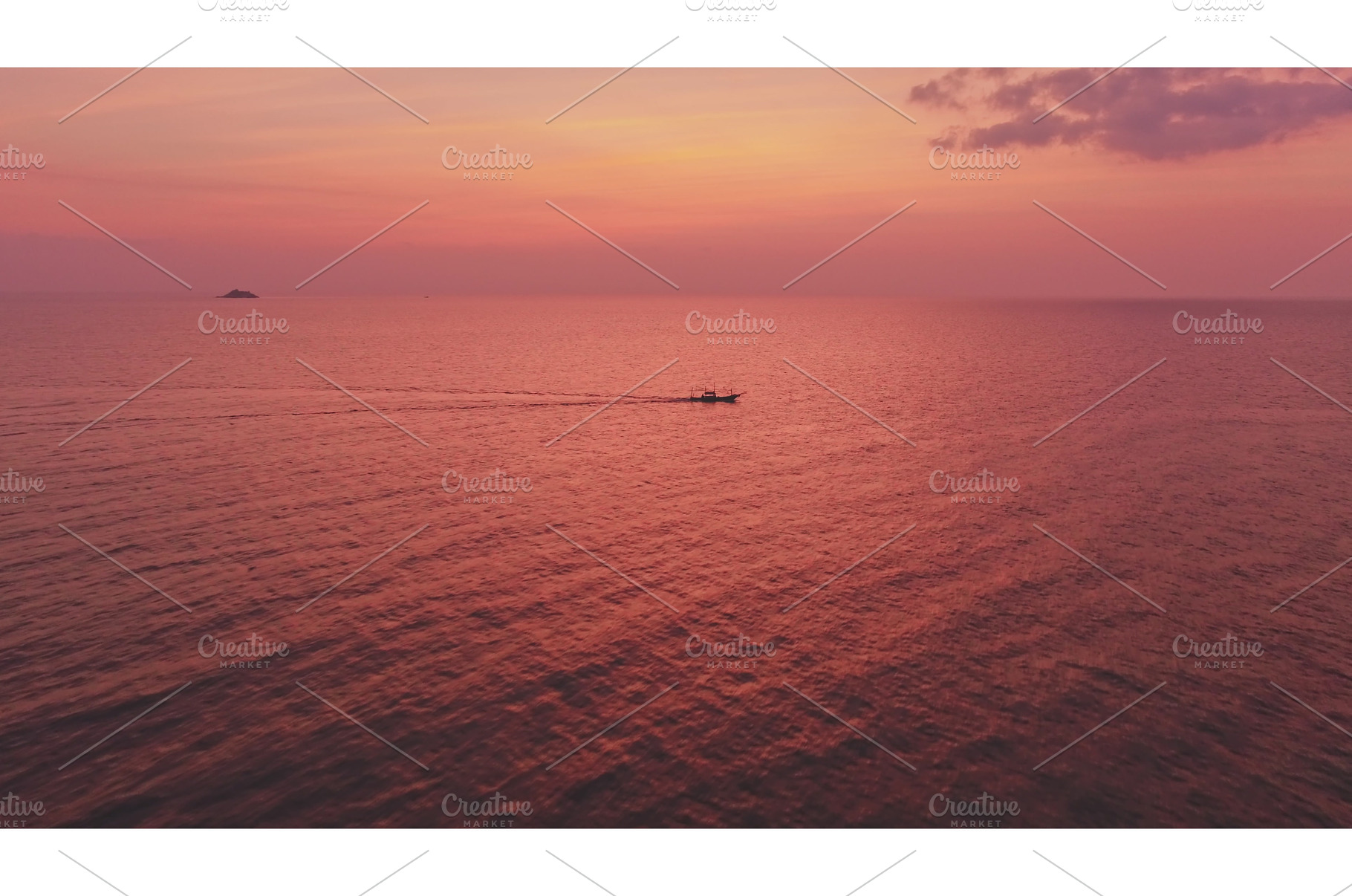 Fishing boat sailing on calm sea at, a Nature Photo by Goinyk
