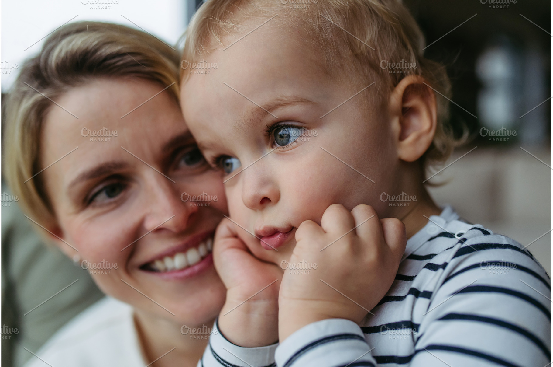 Beautiful mother spendig time with, a Person Photo by HalfPoint
