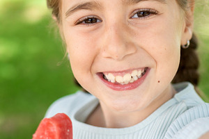 Happy Little Girl Taking a Selfie While Holding a Watermelon Popsicle, a Person Photo by etorres69