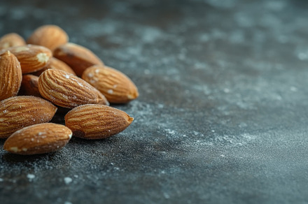 Closeup of raw almonds showcasing th, a Photo by Iftikhar Alam