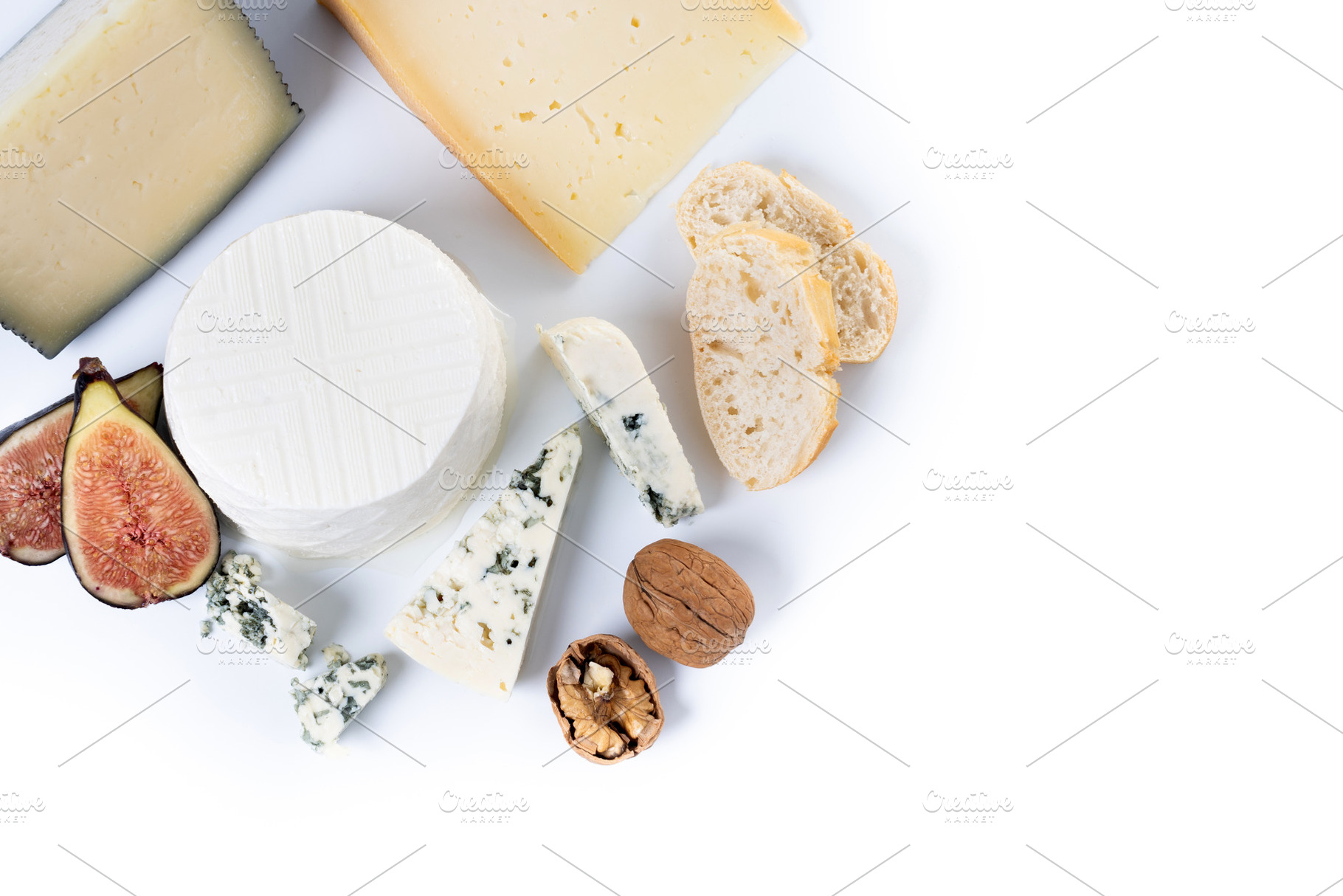 Different cheeses with nuts, figs, grapes and wine, a Food & Drink Photo by etorres69