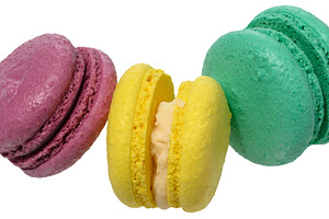 Macarons with a creamy white filling, isolated background. The m, a Food & Drink Photo by ndanko