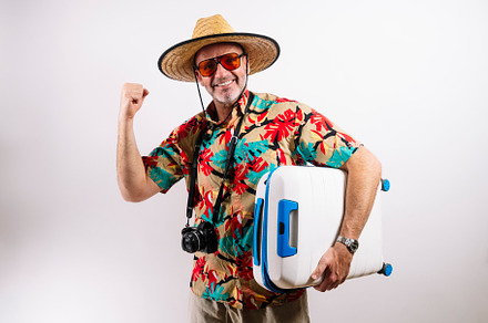 Smiling man ready for tropical vacation adventure