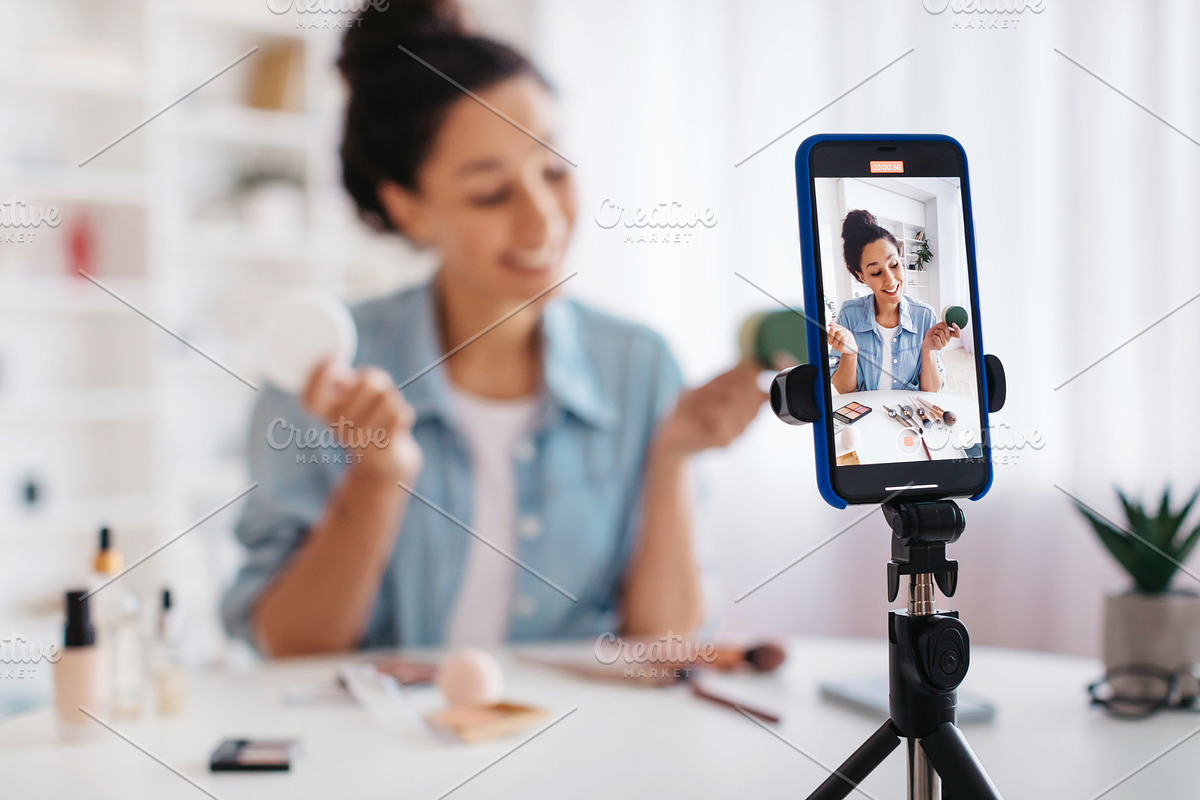 Professional Beauty Blogger Woman Using Smartphone Making Video Indoors, a Photo by Prostock-Studio (Photo 5 of 6)