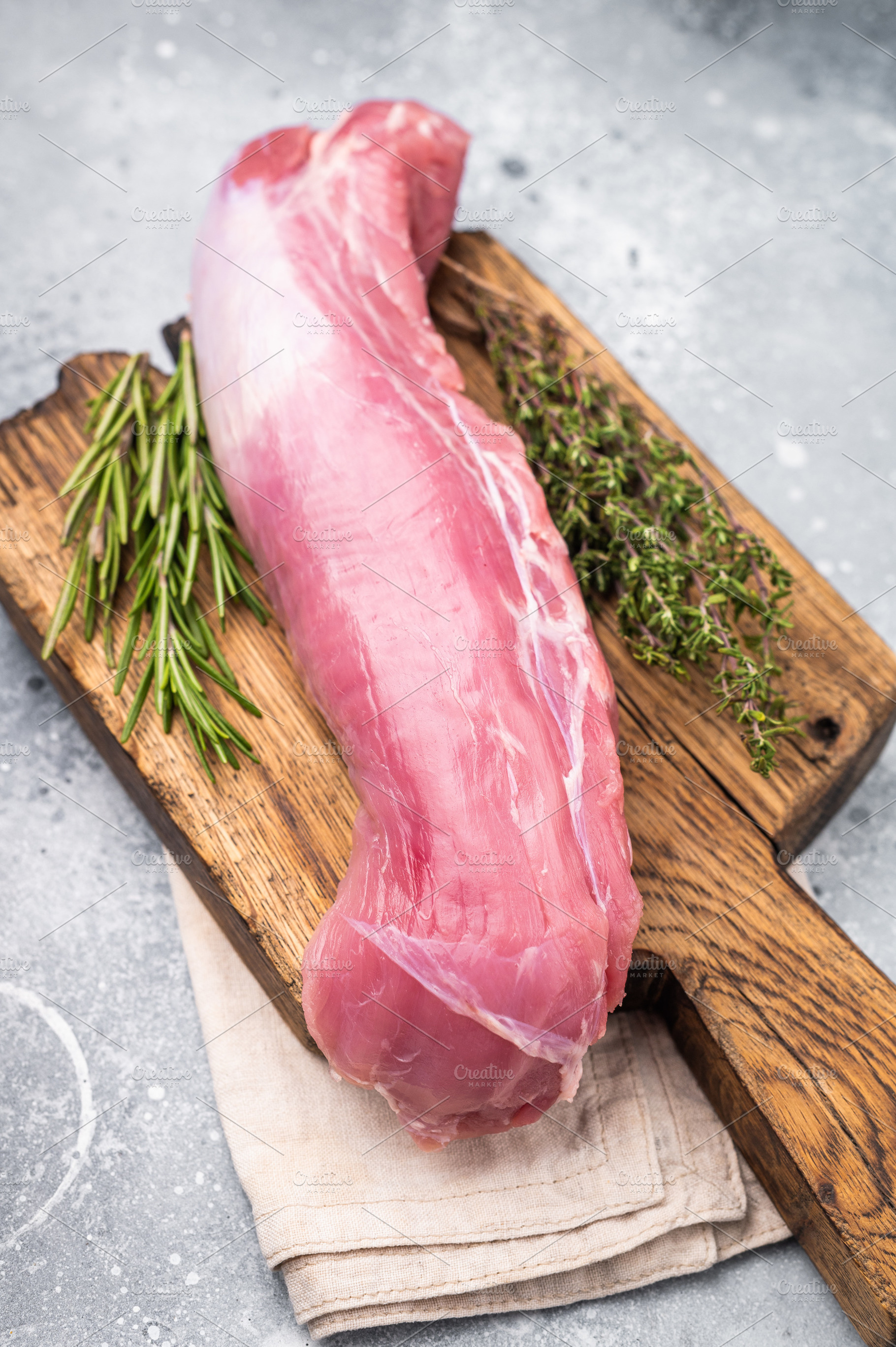 Pristine raw pork tenderloin, ideal for roasting or sautéing, p, a Food & Drink Photo by composter-box@mail.ru