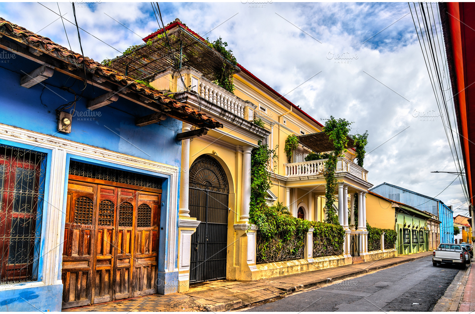 Colorful colonial homes along a, an Architecture Photo by Leonid Andronov