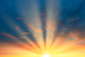 Sunset sky, sun with sun rays beams