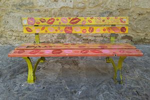 Colorful artistic bench in front of stone wall, an Arts & Entertainment Photo by DanFLCreativo