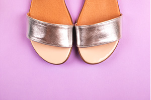 Silver sandals on purple background, a Beauty & Fashion Photo by Anna Efetova