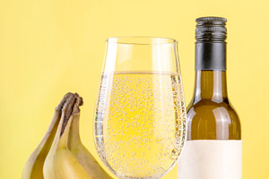 Delicious fermented banana wine craft alcohol drink, a Food & Drink Photo by Rimma