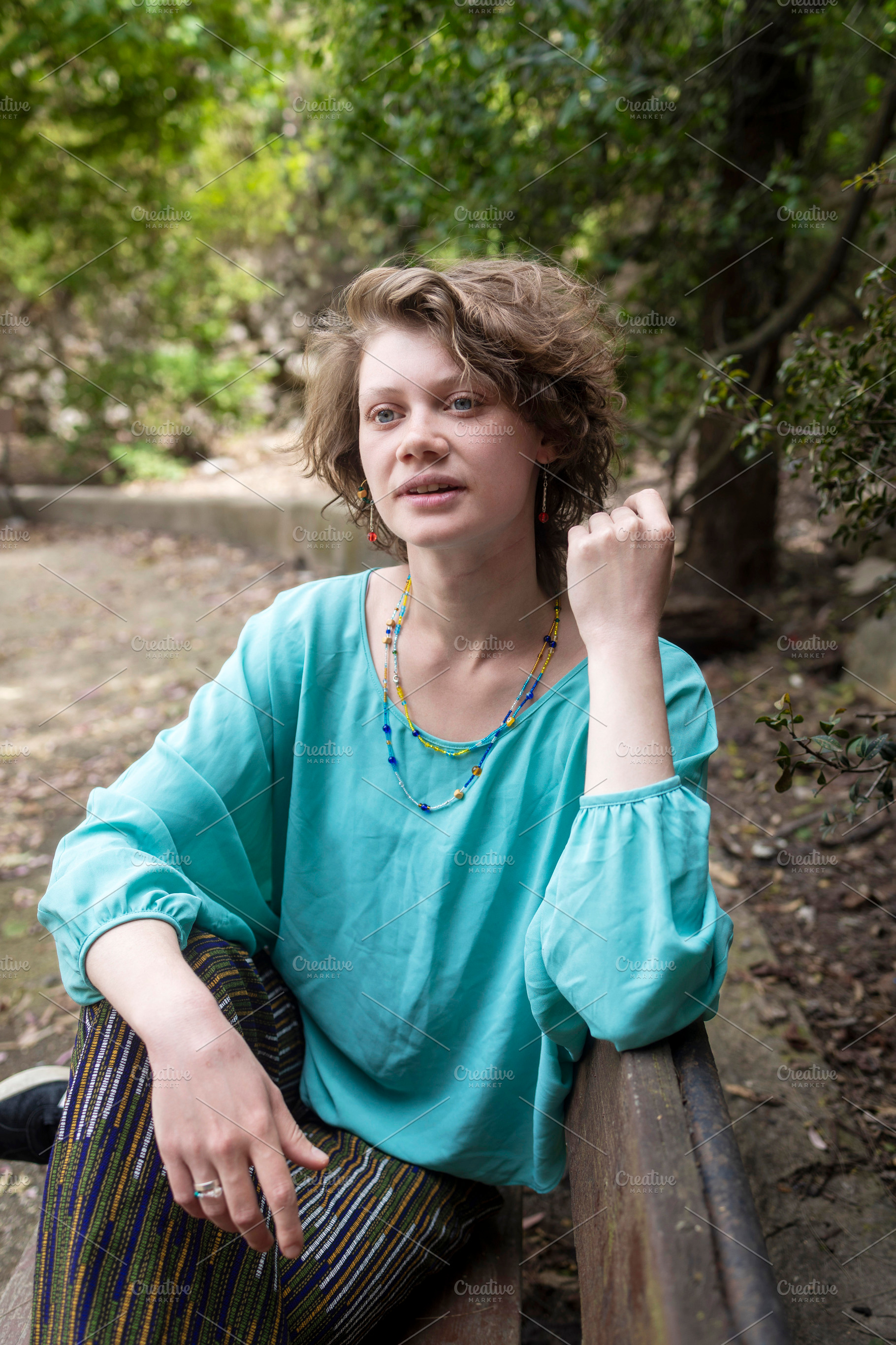 A young woman with expressive blue e, a Person Photo by Imaginarium