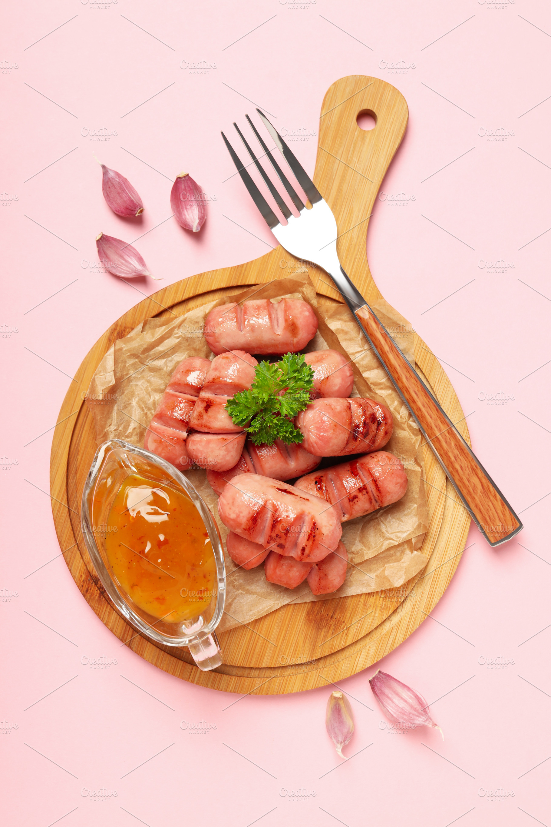 Concept of tasty food, grilled mini sausage, top view, a Background Photo by AtlasStudio PRO