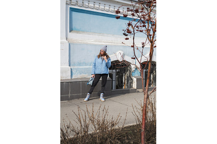 Portrait of a stylish woman in blue, a Person Photo by Jan Jack Russo Media