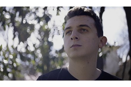 Portrait of a man with black hair, a Person Photo by Media Whale Stock