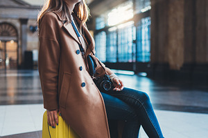 Girl at the station featuring woman, waiting, and suitcase