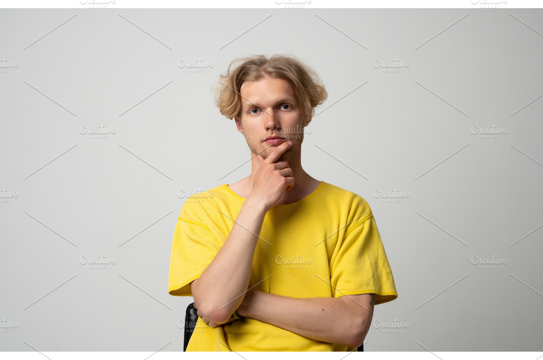 Thoughtful young man with blonde, a Person Photo by volodymyrshtun13795