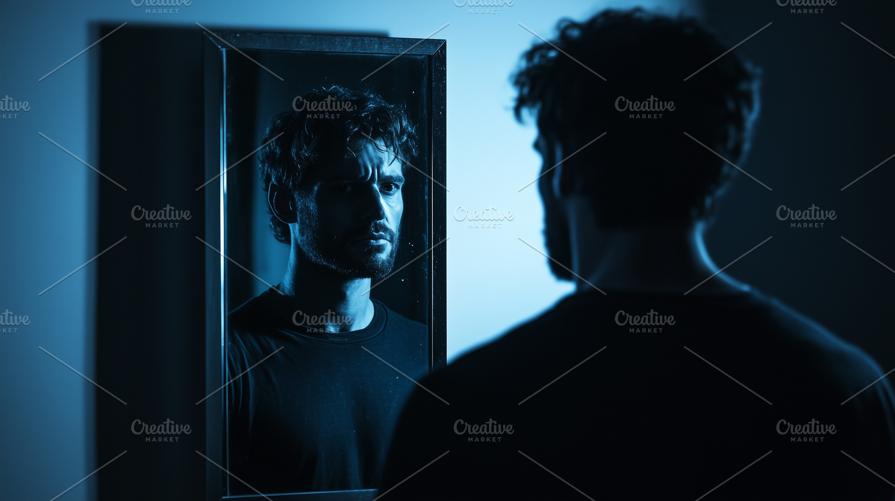 Man stares intensely at reflection, a Person Photo by MistyDay