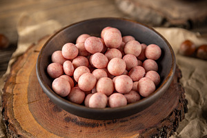 Bowl of covered hazelnuts, a Photo by Grafvision photography