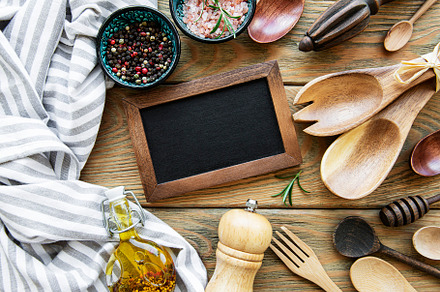 Empty chalk board and kitchen utensils, a Food & Drink Photo by Olena Rudo