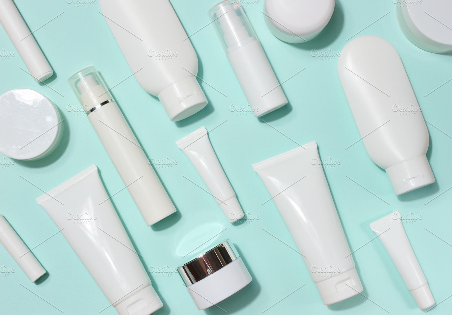 A variety of white plastic tubes and bottles with cosmetics, ran, a Beauty & Fashion Photo by ndanko