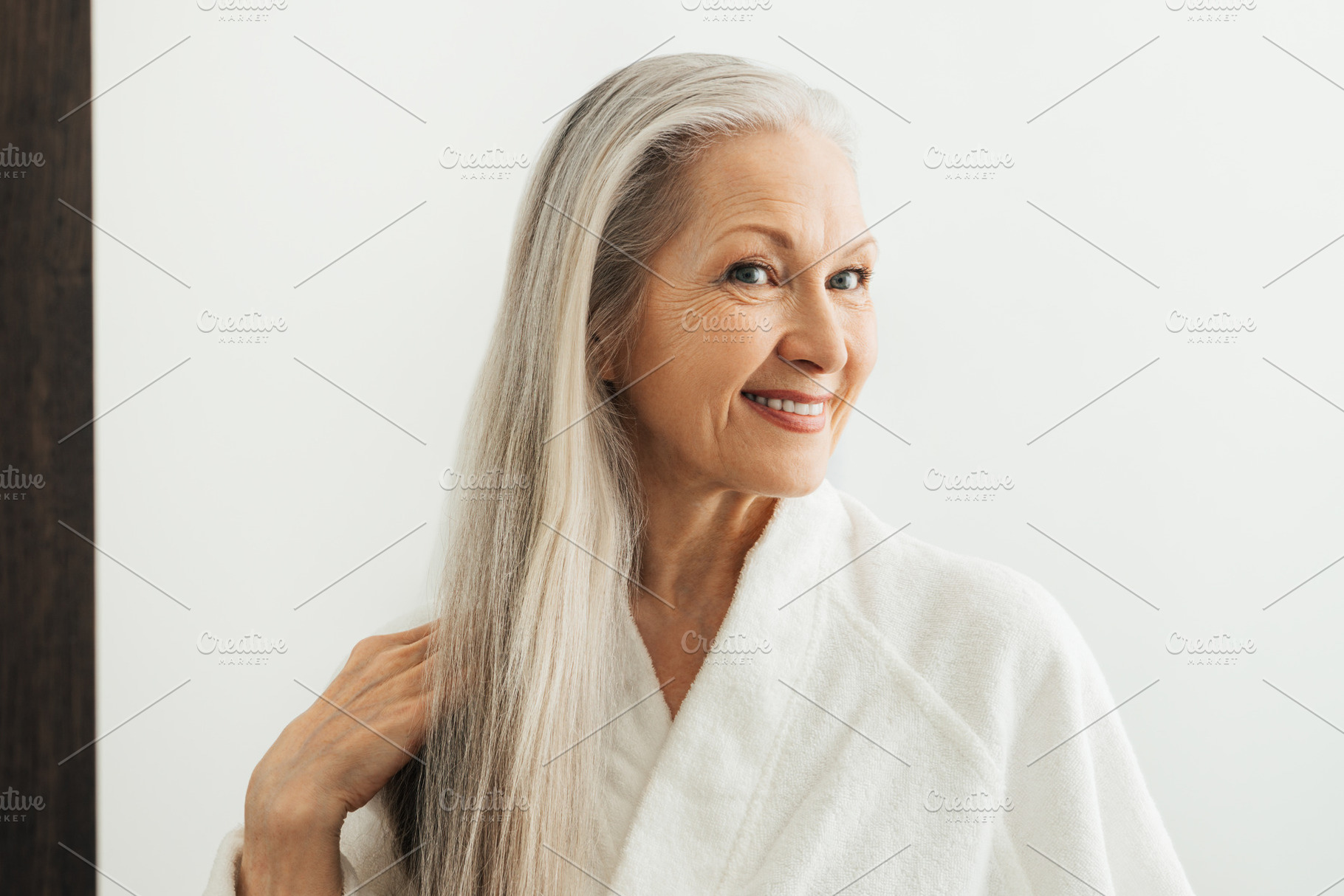 Senior female with grey hair, a Person Photo by Artem Varnitsin