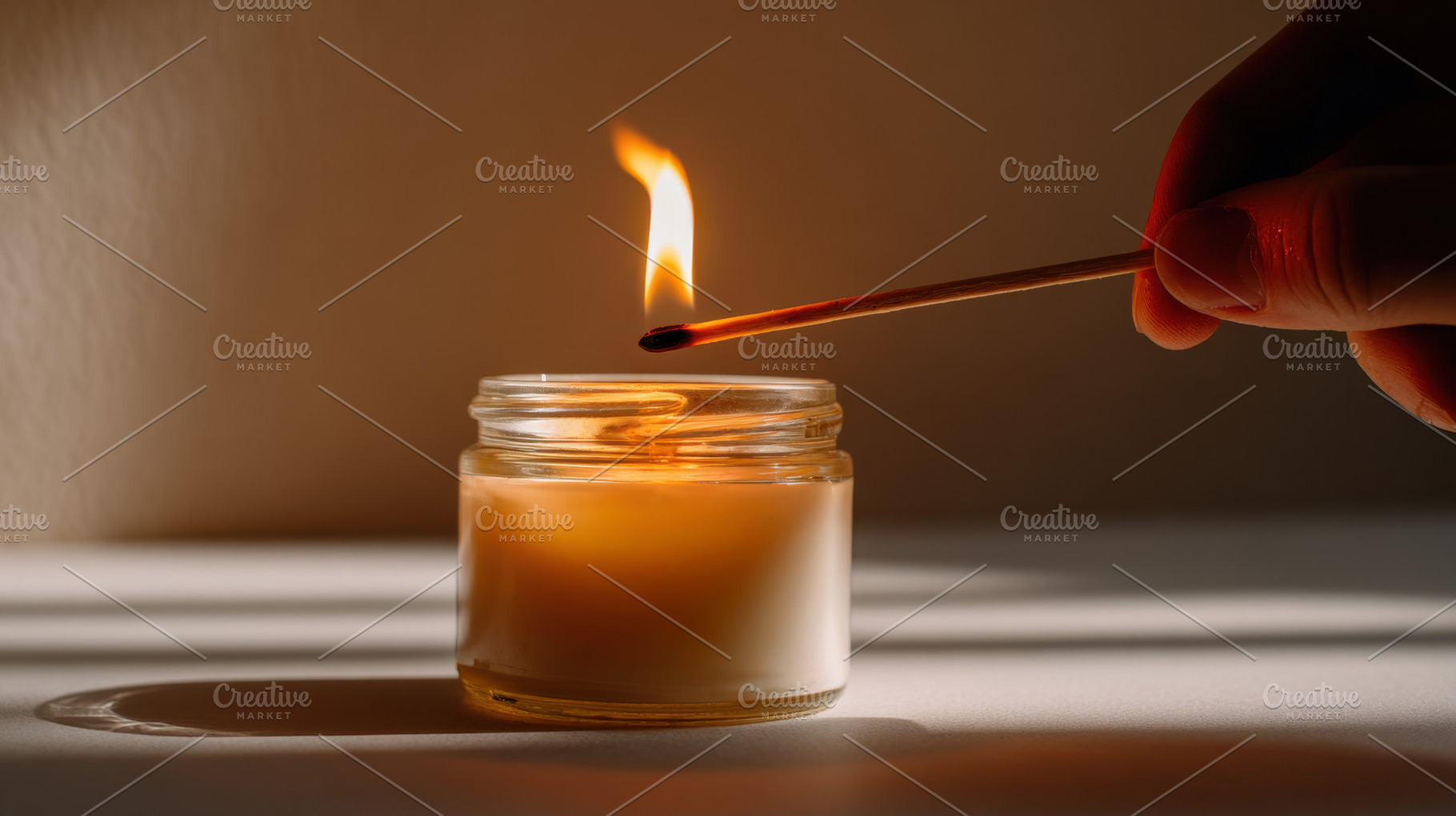 Lighting a candle with a match, a Photo by Beautiful things