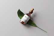Amber Glass Dropper Bottle Mockup, a Cups & Container Mockup by pmvch (Thumbnail 3 of 6)